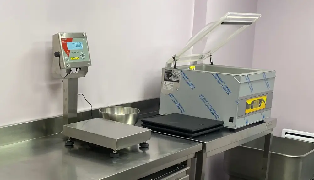 Balance et machine sous vide